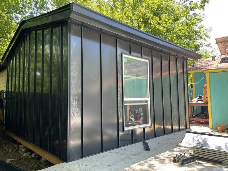 Black standing seam metal wall panels for Metal Roof Installation in Wichita