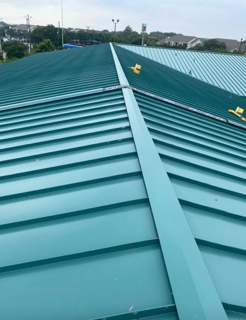Green commercial metal roof ridge and valley for Metal Roof Repair in Wichita
