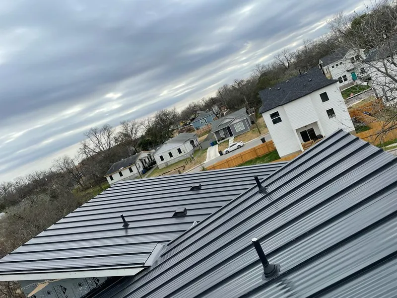 Standing seam metal roof panels with vents for Skylight Repair in Wichita